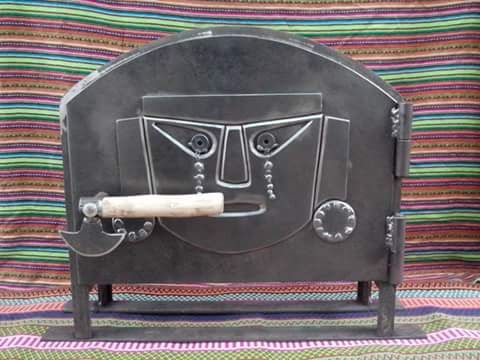 puerta con diseño de la mascara chimú